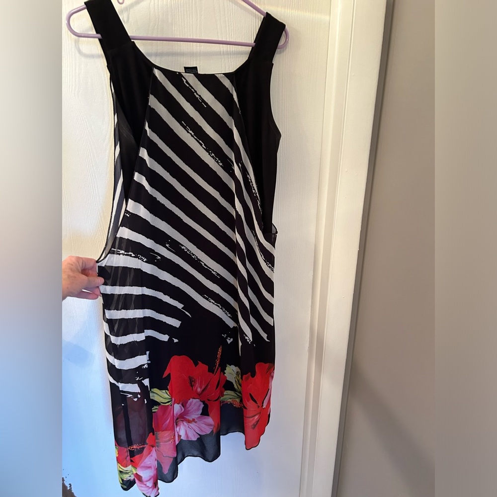 Boutique purchased Dress. Size Large. Worn once for a few hours.